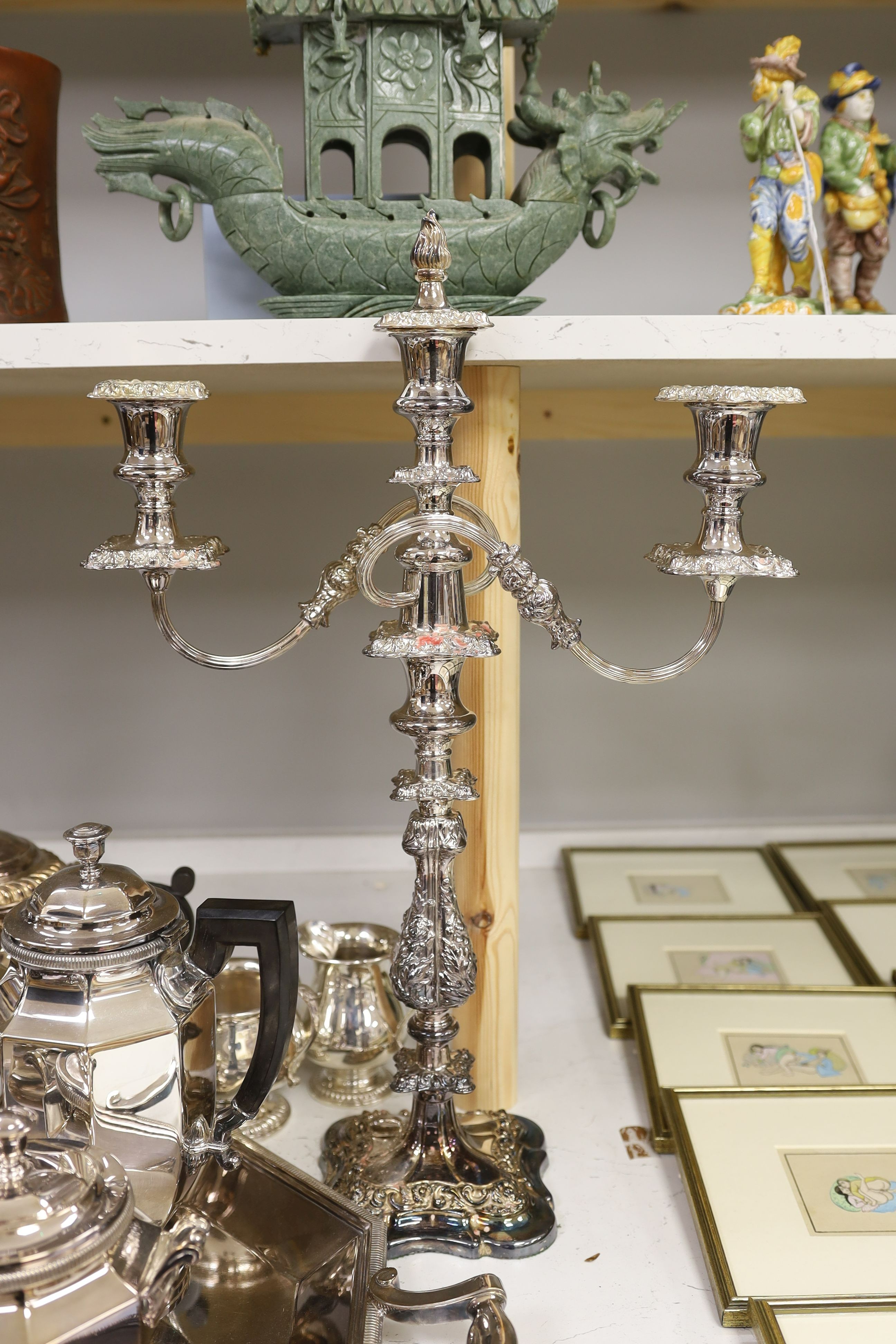 A French plated Cristofle tea set, together with other plated tea wares and a candelabrum